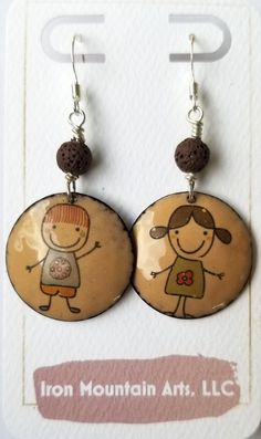 Small hand-cut copper circles are enameled with opaque dark beige, overlayed with fun kids, and paired with funky brown coral beads. Suspended from graceful 20g hypoallergenic ear wires. Back: Thompson's opaque white enamel Vitreous Enamel, Ceramics Pottery Art, Unique Ceramics, Dark Beige, Enamel Earrings, Coral Beads, Small Hands, Simple Jewelry, Happy Kids