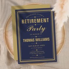 a blue and gold retirement party card on a plate