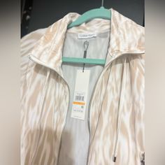 Women's Bomber Jacket Varsity Jacket Classic Coat Light Calvin Klein Casual Spring Outerwear, Calvin Klein Beige Outerwear For Spring, Casual Beige Calvin Klein Outerwear, Calvin Klein Casual Beige Outerwear, Calvin Klein Beige Spring Outerwear, Calvin Klein White Winter Outerwear, Calvin Klein Beige Long Sleeve Outerwear, Casual Calvin Klein Button-up Outerwear, Calvin Klein Tailored Single-breasted Outerwear