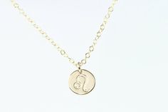 Astrology sign necklace - This dainty gold necklace features a petite but thick 14k gold filled disc with your chosen astrology symbol, suspended from 14k gold filled cable chain. This minimalist necklace makes a symbolic birthday gift! Arrives gift boxed in Sea and Cake packaging. *Length on model is 16 inches *Gold disc is 9mm and 20g thick. *Handmade with love in the USA *All components are 14k gold filled which will last a lifetime, unlike gold plated. *Need a thicker chain? Substitute rolo Gold Minimalist Zodiac Charm Necklace, Gold Dainty Zodiac Sign Charm Necklace, Delicate Wedding Necklace, Gold Necklace Delicate, Tortoise Shell Necklace, Bird Skull Jewelry, Raven Skull Necklace, Leo Necklace, Delicate Gold Jewelry