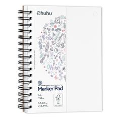 a white spiral notebook with markers and stickers on the cover, in front of a white background