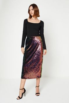 From everyday midis to flirty minis, in a wide range of fabrics and prints, our skirts will flatter every silhouette. Think printed satin, black leather and monochrome tweed; whatever you're looking for, our skirt edit has all the best styles. Style: Velvet Sequin Midi Skirt.  Ideal for: Christmas.  Design: Sequin.  Model wears size UK 10 and is 5' 9" tall. Sequin Midi Skirt, Oasis Fashion, Fashion Face, Christmas Design, All The Best, Oasis, Cool Style, Midi Skirt, Sequin