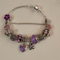 Silver Plated Charm Bracelet With Clasp And Zirconia Crystals And Purple & Pink Beads Also Able To Add And Change Charms For Your Valentine Or Mother's Day Gifts #P1 Purple Purple Charm Bracelet, Purple Valentine, Jewelry Lookbook, Pandora Bracelets, Pink Beads, Pandora Bracelet, Dream Jewelry, Flower Charm, Cute Jewelry