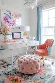 a pink tufted ottoman sits in front of a white desk with flowers on it