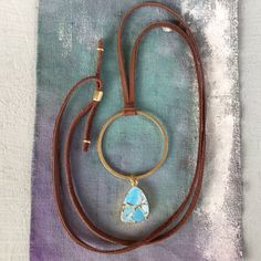 New Handcrafted Necklace Adjustable To 30” Brown Genuine Leather Soft Deerskin Cord Blue Turquoise Gold Plated Pendant Approx 20-15mm Antique Gold Tone Brass Circle 1.5” Diameter Handcrafted In California, Not Associated With Sundance Catalog Brand Bundle Up And Save Even More 10% Please Review My Other Handcrafted Unique Jewelry On Sale Fast Shipping Handmade Adjustable Brown Turquoise Necklace, Adjustable Brown Turquoise Bohemian Necklace, Blue Adjustable Necklace For Everyday Use, Blue Bohemian Necklaces For Everyday Use, Bohemian Blue Necklaces For Everyday Use, Bohemian Brown Necklace For Everyday Use, Everyday Bohemian Turquoise Necklace, Handmade Turquoise Necklaces For Everyday Use, Handmade Turquoise Necklace For Everyday Use