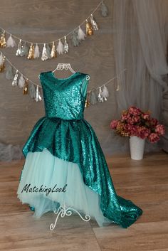 Little Mermaid Dress, Mermaid Outfit For Girls, Ariel Dress Princess sequin tutu dress is designed specially for your loveliest daughter. Lovely dress in turquoise color sequins and full tulle skirt. Dress has train and open back. Tutu hi lo dress is perfect for any special occasion in life of your daughter - birthday, party, wedding as flower girl and any other event. With this dress your daughter will receive many compliments. Look at my other dresses in my shop https://www.etsy.com/shop/Match Blue Mermaid Hem Dress For Pageant, Green Mermaid Dress For Wedding, Green Fitted Mermaid Dress, Fitted Green Gown For Dress-up Occasions, Blue Princess Mermaid Dress For Pageant, Princess Style Blue Mermaid Dress For Pageant, Fitted Mermaid Princess Dress For Dress-up, Fitted Green Princess Dress For Fancy Dress, Fitted Mermaid Hem Costume Dress