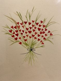 a bouquet of flowers with hearts painted on it