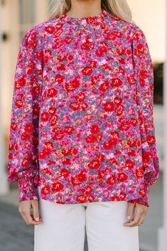 We can't change this blouse nor would we want to! It's gorgeous! That floral print is so vibrant and feminine! This blouse also has a very classic fit that we can't get over! You are going to love wearing this beauty for a day at work or for grabbing lunch with a friend! Round ruffled neckline Button/keyhole back Long bubble sleeves with smocked cuffs Ditsy floral print No stretch Poppy is wearing the small. Floral Print Long Sleeve Blouse For Day Out, Long Sleeve Floral Print Blouse For Day Out, Chic Floral Print Patterned Blouse, Flowy Spring Tops With Vibrant Print, Chic Patterned Floral Print Blouse, Flowy Blouse With Vibrant Print For Spring, Floral Print Patterned Tops For Fall, Patterned Floral Print Tops For Fall, Spring Flowy Tops With Vibrant Print