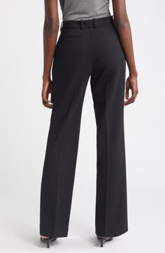 "Find NORDSTROM Straight Leg Pants on Editorialist. Effortlessly move from office hours to happy hour in trouser-style pants cut in a classic straight-leg silhouette with a hint of easy-moving stretch. 32\" inseam; 19\" leg opening; 11 1/2\" front rise; 15 1/2\" back rise (size 8) Zip fly with hook-and-bar closure Front slant pockets; back welt pockets 64% polyester, 31% viscose, 5% elastane Dry clean Imported" Black Bottoms With Welt Pockets Straight Silhouette, Black Bottoms With Welt Pockets And Straight Silhouette, Black Tailored Straight Silhouette Pants, Tailored Black Pants With Straight Silhouette, Tailored Black Straight Pants, Chic Black Pants With Straight Silhouette, Black Bottoms With Straight Silhouette For Business, Black Straight Silhouette Bottoms For Business, Black Business Pants With Straight Silhouette