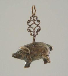 Vintage Pendant - Pig Necklace - Pig Charms - Farm Animal Jewelry - Brass Pendant - Brass Stamping - DIY Earrings - Vintage Stamping - 2psc. This is such a fun vintage brass Blue Ribbon Baby Pig.  This little piggy dangles from a beautiful vintage brass filigree finding. These stampings would make super cute earrings.  You'll receive 2 of these cuties.  You can choose drilled or undrilled These pendants measures 1 1/4" long and 1 1/8" wide Thanks for visiting My Shangri La Pig Jewelry, Pig Necklace, Baby Pig, Baby Pigs, This Little Piggy, Diy Stamp, Vintage Pendant, Vintage Stamps, Brass Pendant