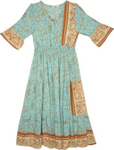 Get those beachy vibes right with this understated v-neck long rayon printed dress.  With a harmonious color combination of sea green, beige and saffron, the dress truly stands out. #tlb #vacationclothing #beachwrap #Fall #Floral #Printed #bohemianfashion #SummerDress #westerndress Bohemian Dresses Long, Hippie Look, Trendy Skirts, Long Summer Dresses, Western Dresses, Bohemian Dress, Summer Hats, Bohemian Style, Fit And Flare