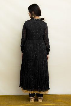 Black mul chanderi anarkali with zardosi hand embroidery. Comes with pant and a dupatta.
Components: 3
Pattern: Hand embroidered
Type Of Work: Zardosi
Neckline: V Neck
Sleeve Type: Churidar Sleeves
Fabric: Mul chanderi, Dupatta : Malai/Mul chanderi, Lining : Fine mulmul
Color: Black
Other Details: 
Chinta work all over
Embroidered dupatta
Disclaimer : The natural imperfection and textures in the weaves are the outcome of handloom fabrics (not to be considered as defect)
Occasion: Sangeet - Aza F V Neck Churidar, Churidar Sleeves, Chanderi Anarkali, Chanderi Dupatta, Embroidered Anarkali, Handloom Fabric, Embroidered Dupatta, Fashion App, Churidar