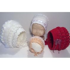 three crocheted hats and two baby bonnets