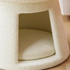 a cat bed that is made to look like it's in the middle of a room