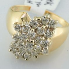 This 14k Yellow Gold Cluster Ring Contains .75ctw Of Si Clarity G-H Color Natural Diamonds. 14k Gold Cluster Diamond Ring, Yellow Gold Cluster Ring With 17 Jewels, Yellow Gold Cluster Jewelry With Brilliant Cut, 14k Gold Cluster Diamond Ring With Vvs Clarity, 14k Gold Cluster Diamond Ring In Diamond White, 14k Gold Cluster Diamond Ring Fine Jewelry, Fine Jewelry Diamond White Cluster Ring Stamped 14k, Diamond White Cluster Ring Stamped 14k, Fine Jewelry 14k Stamped Diamond White Cluster Ring