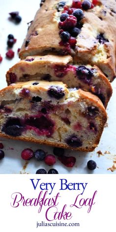 very berry breakfast loaf with blueberries and cranberry sauce on top, cut into slices