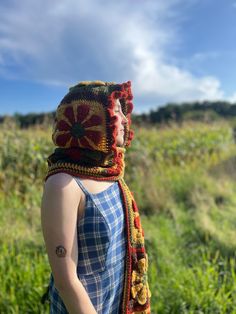 Handmade crochet floral granny square hooded scarf. Made with 100% acrylic yarn. 28"x10" scarf with 21"x13" attached hood. Quick Crochet Clothing Projects, Granny Square Hooded Scarf, Crochet Scarf Hood, Crochet Hood Scarf, Hooded Scarf Crochet, Floral Granny Square, Scarf Hood, Granny Square Scarf, Crochet Hooded Scarf