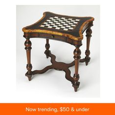 an old wooden table with chess board on it and the price is $ 50 & under