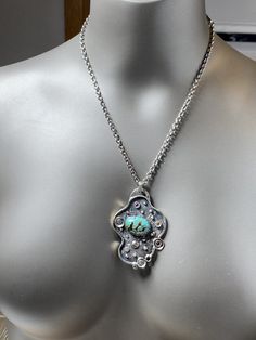 "ARTISAN ROYSTON TURQUOISE PENDANT comes with 20\" chain Hand-made Sterling Silver 925. Stones used: Royston Turquoise, Green Tourmaline, Sapphire, Amethyst. Height -2 1/2\" (with bail), Width - 1 3/4\" Height - 62mm, width-45mm. Unique Handcrafted One-of a-kind Design Pendant. Each Piece of Jewelry in my Collection is Absolutely One of a Kind! When you start wearing a piece of my jewelry you will fall in love with it more and more each day and feel that good Energy and Love that I pass into it Turquoise Sterling Silver Necklace With Oxidized Finish, Elegant Handmade Turquoise Chrysocolla Necklace, Artisan Turquoise Necklace With Oxidized Sterling Silver, Hand Forged Turquoise Sterling Silver Necklace, Handmade Turquoise Sterling Silver Necklace, Oxidized Rectangular Pendant Necklace, Green Oxidized Pendant Necklace, Turquoise Oxidized Spiritual Necklace, Spiritual Nickel-free Turquoise Pendant Necklace