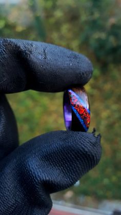 Fumed Eucalyptus wood wrapped around a Dark Purple epoxy core with an inlay of crushed Ruby Red opal and Black Tourmaline between two bands of Lavender Opal. This ring is handmade from Fumed Eucalyptus wood with good weight and a comfortable fit. The ring is coated with acrylate, making for a waterproof and scratch resistant surface. This ring is made with a standard fit. Your ring will be completed in 8-12 days of the order being placed. CUSTOMIZATION The ring will be made in the size you order Lavender Opal, Bentwood Rings, Red Opal, Wood Ring, Bridal Ring Sets, Ring For Men, Wood Rings, Lovely Jewellery, Wedding Jewelry Sets