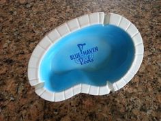 a blue haven bowl sitting on top of a counter