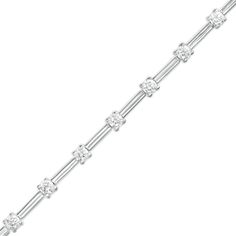 Wrap your wrist in the sleek and sparkling design of this smart diamond alternating line bracelet in white gold. Crafted in cool 10K white gold Shimmering diamonds alternate with polished bars. This 1 ct. t.w. diamond bracelet measures 7.0 inches in length and secures with a box clasp. Modern Channel Set Diamond Bracelet For Anniversary, Modern White Gold Bracelets With Channel Set, Modern White Gold Bracelets Channel Set, Modern White Gold Diamond Bracelet Channel Set, Modern Channel Set Diamond Bracelet In White Gold, Timeless White Gold Channel Set Bracelets, Formal White Gold Diamond Bracelet Channel Set, Modern White Gold Diamond Bracelet With Prong Setting, Box Clasp