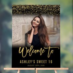 a black and gold welcome sign with the words, welcome to ashley's sweet 16