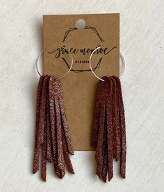 Dont miss out on the beautiful shimmering mocha brown earrings! They are the perfect addition any outfit. The hoops are 1 inch in length with the petite short fringe measuring at 2.5 inches. Total Length Measurements 3.5 inches The leather fringe are lightweight and move as you move showing layers of the shimmering buttery soft deep mocha leather. They are simply beautiful! So lightweight you will forget you are wearing earrings at all. The hardware is safe for sensitive ears. Be sure to check o Brown Dangle Earrings For Party, Nickel-free Brown Hoop Earrings As Gift, Nickel-free Brown Earrings For Party, Brown Jewelry With Matching Earrings For Parties, Brown Party Jewelry With Matching Earrings, Leather Fringe Earrings, 2024 Jewelry, Trending Earrings, Earrings Boho Chic