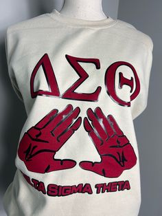 This stylish vintage "Delta Sigma Theta" sweatshirt not only makes a statement, its soft cozy material will make it your new favorite staple Swestshirt to wear. Looks especially great with your well-loved pair of jeans or with your casual look. What will you pair it with?  SIZING **Sizing Recommendation Unisex Fit HaveHartDesigns LLC. was established to provide cute & comfortable apparel for everyday wear! All of our tees are available in different sizes, colors, & styles including shirts, tank Cream Crew Neck Sweatshirt With Graphic Print, Cream Crew Neck Sweatshirt With Logo Print, Cream Hoodie With Letter Print And Crew Neck, Cream Crew Neck Hoodie With Letter Print, Theta Sweatshirt, Delta Sigma Theta Apparel, Delta Sigma Theta Gifts, Delta Design, Delta Girl