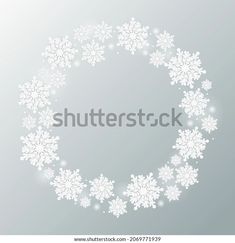 snowflakes in the shape of a circle on a gray background