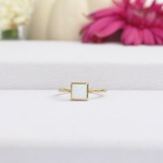 White opal ring is a new trend minimal product that you can use every day with a unique stone selected by ISEA Fine Jewelry. ➤ Ring Details * 14k / 18k Yellow Gold or Yellow Sterling Silver * Gold Color Options; 14K / 18k White, Yellow, Rose Gold * Sterling Silver Color Options; Yellow, Rose, White * Band Width: 1.45 mm * Thickness: 1.35 mm ➤ Gem Details * Gemstone : Opal * Gem color: White * Gem width: 6 millimeter * Gem length: 6 millimeter * Cut Type: Princess * Ready to Ship 3-5 Business Days 💍 ISEA Jewels' pieces are handcrafted by 10-15 years of experienced craftsmen and made to order in a very short time. 🎁 All pieces come in a quality and hygienic suede gift box enclosed in a pouch. 🌎 Our products arrive worldwide within 6 working days. ❓ Questions, comments, or just want to say Rectangular Opal Ring, Square Opal Ring, Adjustable 14k Gold Opal Ring Gift, Elegant Nickel-free Opal Ring For Gift, White Moon-shaped Opal Ring Gift, Twisted Ring, Silver Opal Ring, White Opal Ring, Ring Light