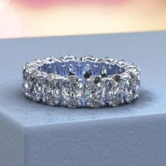 An exquisite reflection of your love, this fancy-shape diamond eternity band is certain to thrill for wedding or anniversary. Expertly crafted in sleek 14K White Gold, this remarkable design showcases sparkling 16 pieces 6x4 mm 6.5 Carat T.W. oval-cut CZ - each boosting a color rank of H and clarity of VS2 - that surround the endless band. Please remember that you can customize this ring in any way you would like in 3D. The exact number of diamonds and total carat weight will vary depending on t Princess Braids, Oval Eternity Band, Anniversary Bands For Her, Diamond Anniversary Bands, Oval Moissanite, Diamond Anniversary Rings, Diamond Anniversary, Brown Diamond, Jewelry Diamond