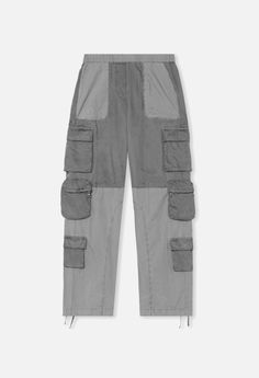 Mid rise, oversized cupro-paneled pant with 3D cargo pockets. Elasticated waist. Adjustable ties at bottom cuffs for styling versatility. Back flap patch pockets. Front slash 3D patch pockets. Various cargo pockets throughout. Garment dyed. Self: 100% Cotton. Contrast: 100% Curpro. Parachute Cargo, John Elliott, Patch Pocket, Mid Rise, Pants, Black, Trousers