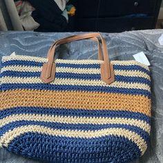 This Is A Mia And Tess Woven Shoulder Tote. The Color It Comes In Is Called “Natural”, And Has Beautiful Woven Blue, Gold And Yellow! The Leather Straps Are Sturdy And Comfortable. There Is One Pocket On The Inside But The Rest Is All Open So You Can Store As Much Or As Little As You Like. The Top And Can Also Zip Closed! This Is New With Tags! Blue Summer Bags For Day Out, Blue Summer Bag For Day Out, Blue Bags For Summer Day Out, Spring Beach Bags In Blue, Blue Beach Bags For Spring, Chic Blue Shoulder Bag For The Beach, Chic Blue Shoulder Bag For Beach, Blue Spring Beach Bag, Spring Beach Blue Bag