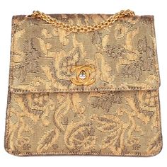 CHANEL Gold Metallic Floral Woven Jacquard Vintage Mini Flap Bag Serial Number: 5146600 Age (Circa): 1997 Accompanied By: Chanel Dust Bag, Authenticity Card, Care Booklet Authenticity Details: Authenticity Card, Serial Sticker (Made in France) Gender: Ladies Type: Shoulder Colour: Gold Hardware: Gold (24k Plated) Material(s): Woven Jacquard Interior: Gold Leather Closure: Turn Lock Height: 15cm Width: 17cm Depth: 7.5cm Strap Drop: 46cm -The exterior is in excellent condition with light signs of Bag Flower, Chanel Shoulder Bag, Handbags Online, How To Make Notes, Gold Leather, Flap Bag, Michael Kors Monogram, Fashion Handbags, Purses Crossbody