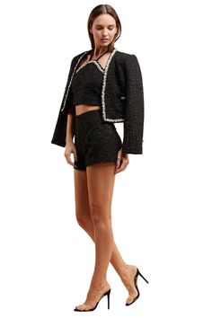 Description: Embrace timeless elegance with our Pearl Essence Tweed Short Set. This ensemble features a luxuriously textured tweed with delicate pearl detailing that adds a touch of sophistication. The cropped jacket with its classic button and pocket design pairs flawlessly with the high-waisted shorts, offering a modern twist on a classic style. Perfect for celebratory occasions or when you simply want to make a refined statement. Available in a crisp, versatile white that’s sure to turn heads Casual Beach Wear, Tweed Shorts, Cropped Jacket, Short Set, New Arrival Dress, Shop Swimwear, Black Media, Monday Friday, Pocket Design