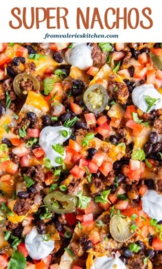 this mexican salad is loaded with black olives, tomatoes, peppers, cheese and sour cream