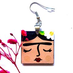 Frida earrings. An amazing Frida-inspired jewelry gift idea for every Fridamaniac or Fridalover out there. So cute Frida Jewelry. Original Artwork. They were created using high quality acrylic paint which had been protected with a special clear acrylic sealer to ensure its durability. Very light to wear and one of a kind accessory. Shape: Square Technique: Hand Painted Material: Wood Size: 1 inch They come in a beautiful and elegant gift box. Order Now! Limited Quantities/Limited Edition.Get the Frida Earrings, Frida Kahlo Earrings, Inspired Jewelry, Elegant Gift, Material Wood, Acrylic Paint, Clear Acrylic, Jewelry Gift, So Cute