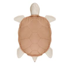 a brown turtle pillow on a white background