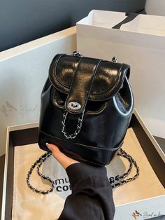 Bird in Bag - Premium PU Leather Rotary Lock Chain Backpack with Spacious Capacity, Exuding Style and Sophistication Leather Backpack For Evening, Chic Backpack With Hasp Closure, Trendy Travel Backpack With Chain Strap, Everyday Backpack With Chain Strap, Elegant Black Backpack With Large Capacity, Chic Leather Backpack For School, Elegant Black Evening Backpack, Elegant Bucket Backpack For Travel, Lock Chain