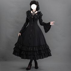 Fascinating black. A long dress decorated with statement frills on the neckline and hem, and a gothic blouse. A structured silhouette that exudes a sense of dignity. The dress is decorated with lacework on the back. Become a fascinating dark princess. 
 
 

 

 
 
 Item 
 
 One Piece 
 Blouse 
 
 
 Size 
 
 One Piece 
 
 S size 
 
 Length: 120cm 
 Bust: 84cm 
 Waist: 66cm 
 
 M size 
 
 Length: 120cm 
 Bust: 88cm 
 Waist: 70cm 
 
 L size 
 
 
 Length: 120cm 
 Bust: 92cm 
 Waist: 74cm 
 
 XL size Gothic Ruffled Corset Dress For Costume Party, Fitted Ruffle Dress For Cosplay, Fitted Vintage Dress With Ruffles For Cosplay, Gothic Vintage Dress For Cosplay, Gothic Black Vintage Dress For Party, Elegant Halloween Corset Dress For Alternative Fashion, Gothic Ruffled Dress For Cosplay, Witchy Costume Dresses With Ruffles, Witchy Ruffled Costume Dresses