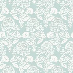 a light blue and white wallpaper with an intricate design on it's side