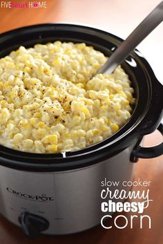 slow cooker creamy cheesy corn is ready to be eaten