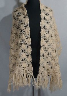 "Here is a marvelous vintage soft cream colored hand made white crochet lace shawl / scarf / wrap with fringe at the ends. Boho style! This soft woven and quite exquisite scarfwas probably crocheted with acrylic yarn thread. You'll love how the lace design - it is such a lovely pattern and works as a jacket/coat/shrug layer for romantic and precious looks. You will adore having this forever artifact garment. It's in really great vintage overall condition with more minor signs of time and use but White Vintage Shawl For Winter, Handmade Cream Shawl One Size, Bohemian Cream Knitted Shawl, Handmade Cream Shawl For Winter, Vintage White Winter Shawl, Bohemian Beige Crochet Lace Shawl, Cream Bohemian Crochet Shawl, Bohemian Cream Crochet Shawl, Bohemian Cream Crochet Lace Shawl