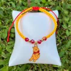 winnie the pooh beaded bracelet with red beads