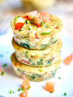 a stack of food sitting on top of a white plate