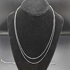 New In Box. Necklace 20" Long With Adjuster Chain. Silver Toned With Faint Blue Tiny Beads. Bracelet Also Has An Adjuster For Smaller Or Larger Wrists. Great For Yourself Or As A Gift Multi-strand Silver Chain Necklace As Gift, Silver Double Strand Necklace With Silver Beads, Silver Layered Necklace As A Gift, Silver Multi-strand Layered Necklace With Beaded Chain, Silver Necklace With Adjustable Chain And Round Beads, Silver Beaded Chain Layered Necklace, Adjustable Double Strand Silver Chain Necklace, Silver Layered Beaded Chain Necklace, Silver Round Beads Chain Necklace Gift