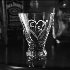 an empty glass sitting on top of a table