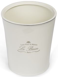 a white cup with the words la boun written on it's rim and bottom