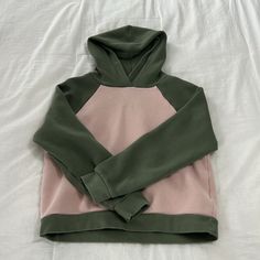 Size Small Pink And Olive Green Shrunken Fit New Unused Condition Organic Cotton And Recycled Polyester Blend Comfortable Pink Cotton Sweatshirt, Pink Sporty Sweatshirt With Cozy Fit, Pink Cozy Fit Sporty Sweatshirt, Pink Casual Color Block Sweatshirt, Pink Color Block Sporty Sweatshirt, Casual Pink Color Block Sweatshirt, Pink Casual Cozy Fit Sweatshirt, Pink Cozy Fit Casual Sweatshirt, Sporty Pink Color Block Sweatshirt